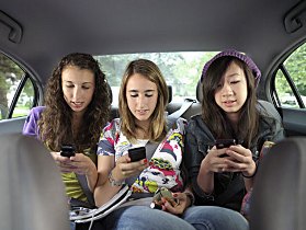 File:Teens-on-cell-phones.jpg