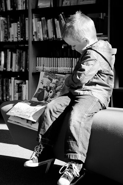 File:Boy Reading Book.jpg
