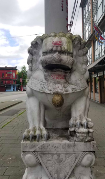 File:Defaced Lion Statue.png