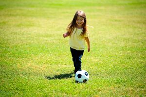 Girl playing soccer.jpg