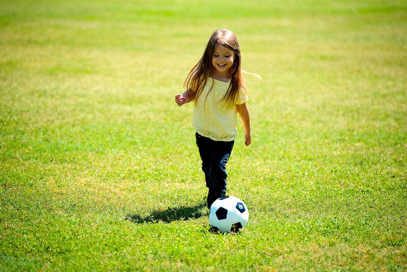 File:Girl playing soccer.jpg