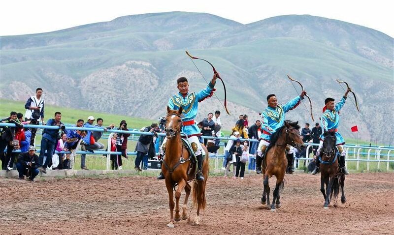 File:Yugur horsemen perform equestrianism during a traditional ethnic minorities sports meeting.jpg