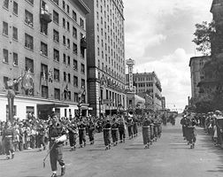 1946: A military parade for the Diamond Jubilee travelling west in the 800 Block of Georgia Street. Photo from the Vancouver Archives